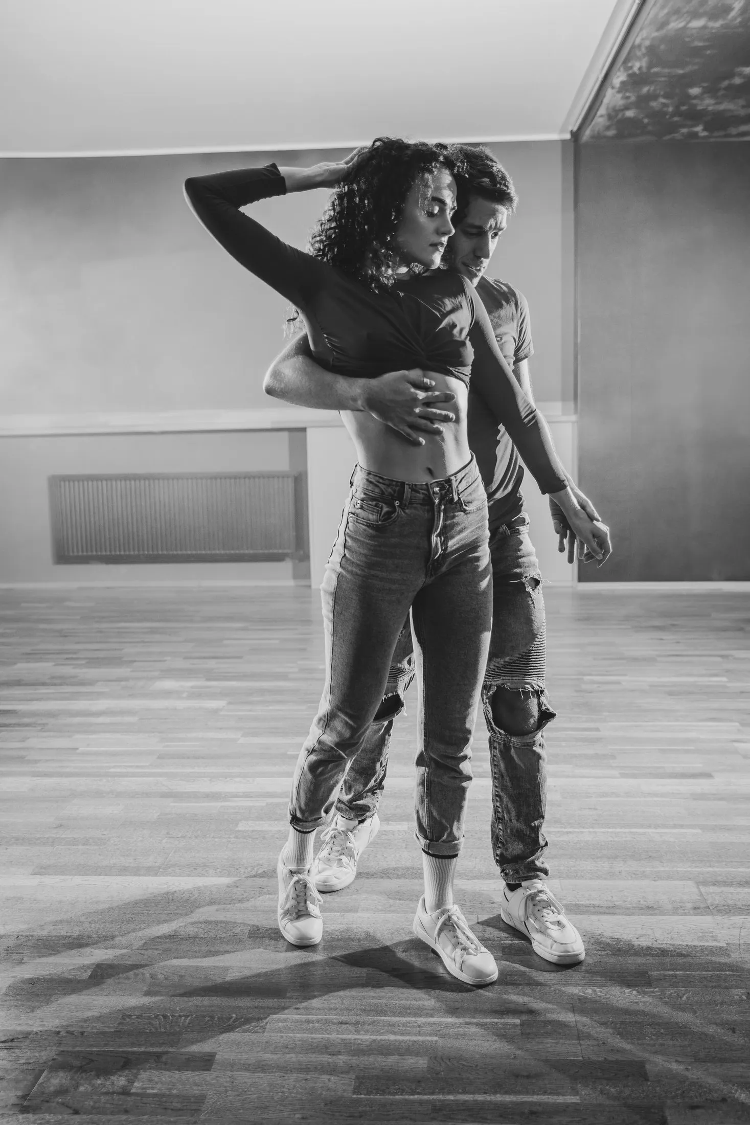 Fotografie z Enamour Dance Academy – detail párového tance bachata sensual